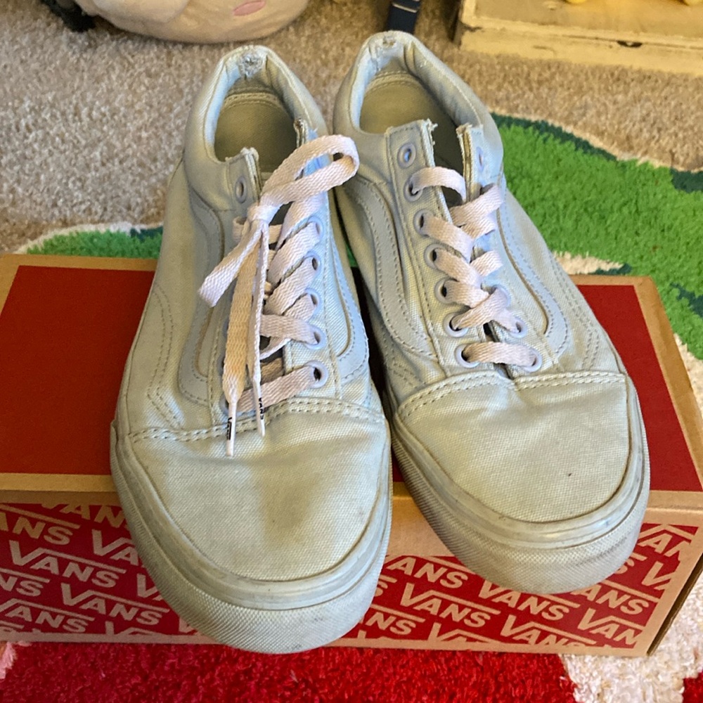 Custom vans with white laces with a little dirt